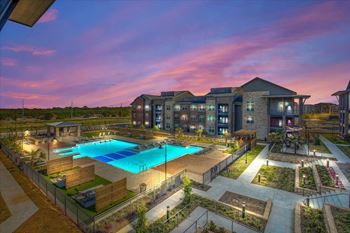 Resort style pool complete with cascading water features
